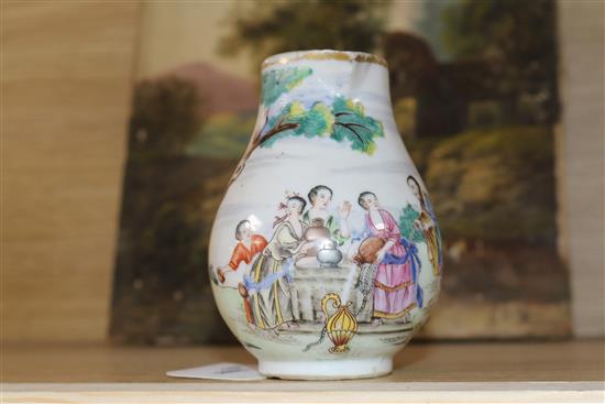 A Chinese Export polychrome sparrowbeak cream jug in the European taste, a punch bowl and a plate (damage and repairs)